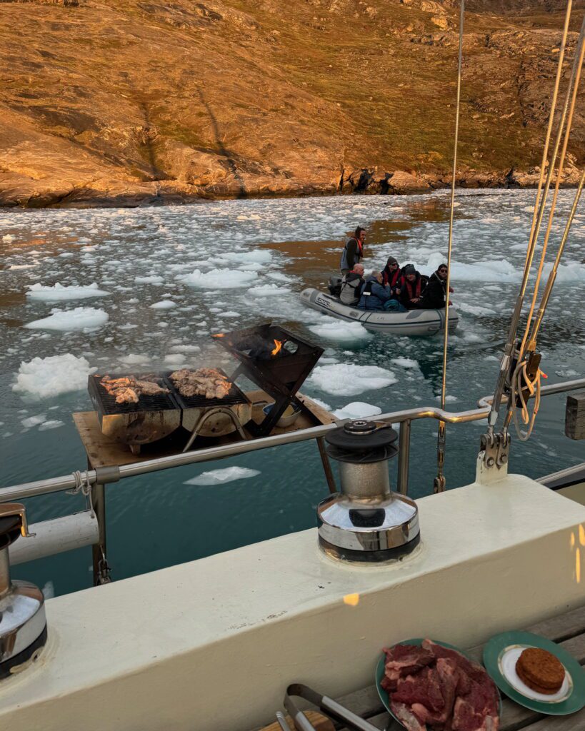 Eastern Greenland: Exploring The Solitude of Scoresbysund Enjoying a barbecue inbetween slush ice in Eastern Greenland