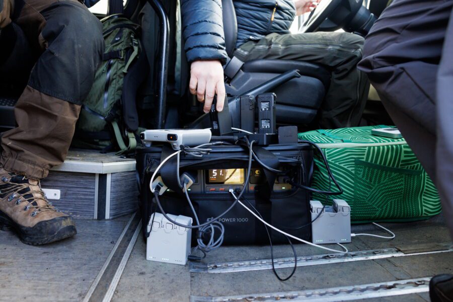Charging a lot of drone batteries on a photography workshop